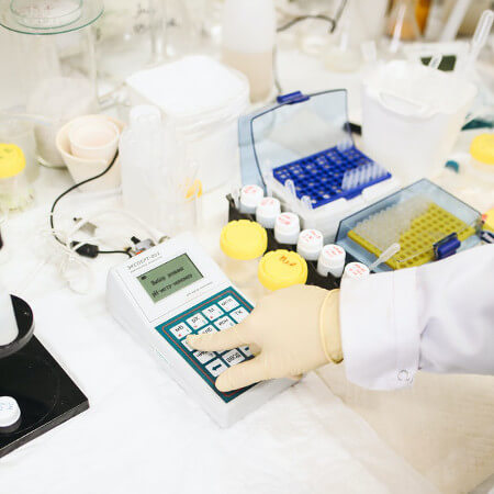 Scientist Conducting Test on Lab Equipment